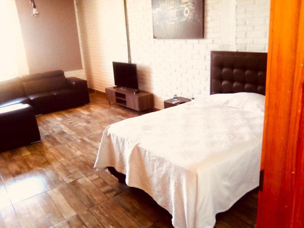 Hotel "Casa Mangata" Пуэрто-Ариста Экстерьер фото